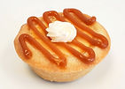 Special buttertrait cheesecake nut free with caramel swirl and dollop of buttercream