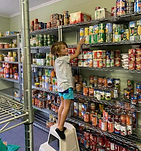 kid working at food pantry