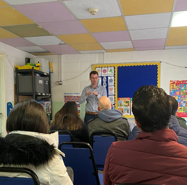 Image of Joe, the instructor, delivering a session to parents at a pre-school
