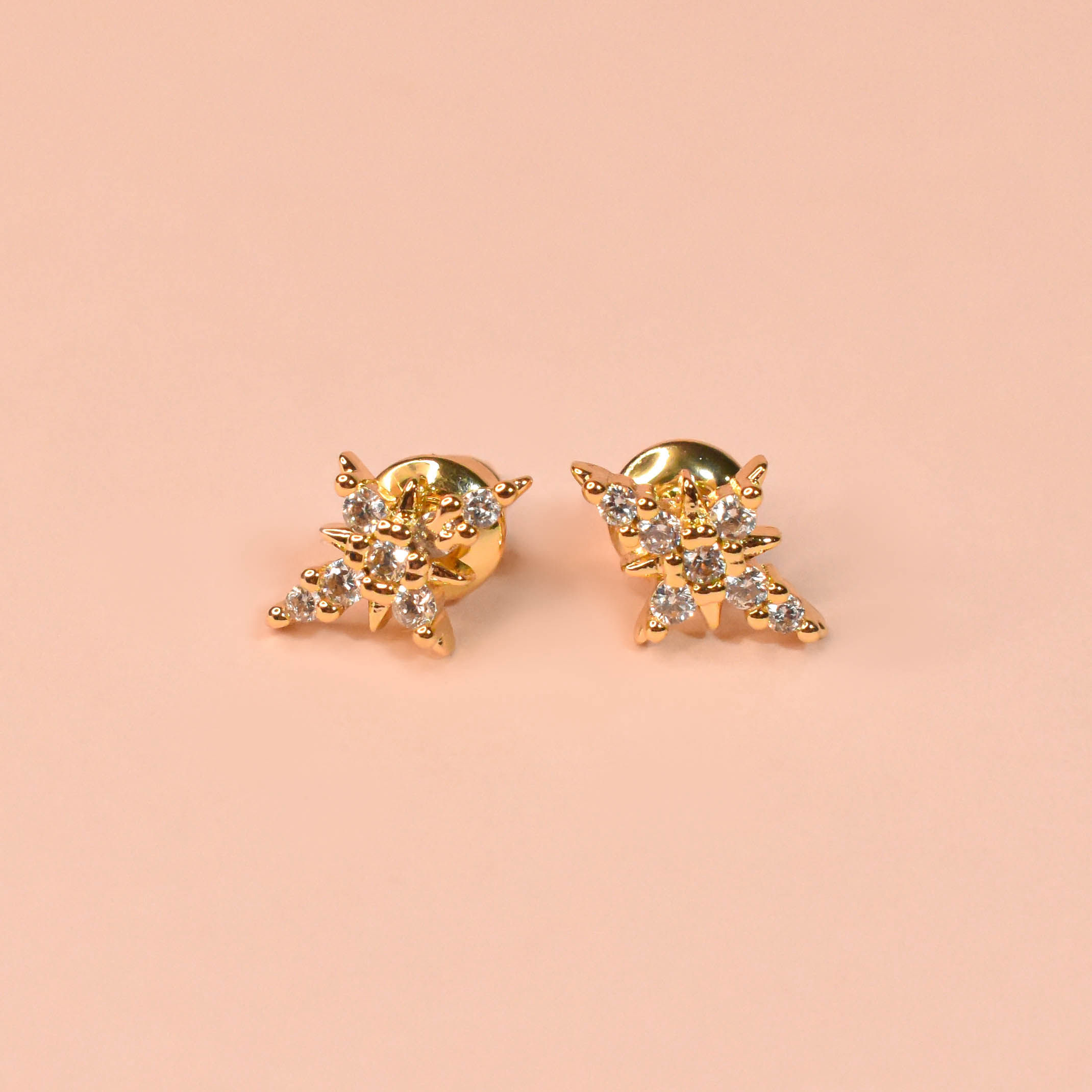 Aretes estrella zirconis