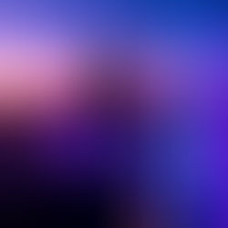 Silhouette of a person standing on a rooftop overlooking a vibrant, neon-lit futuristic city skyline at sunset. Tall glowing blue and purple light beams rise from the city below. The scene evokes a sense of vision and possibility in a vast digital landscape.