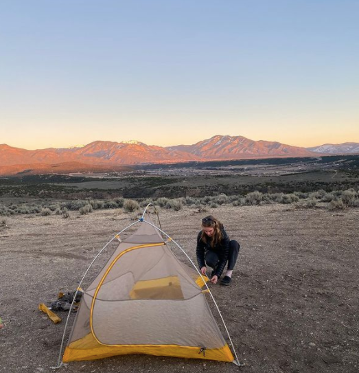Setting up a tent, sunset, public lands