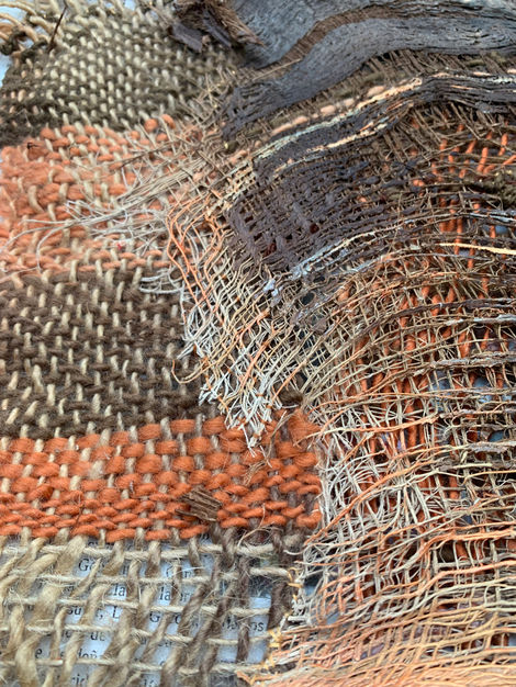 Palm tree treated with textile techniques such as loom-woven tapestry, embroidery, darning, sewing, and acrylic painting.