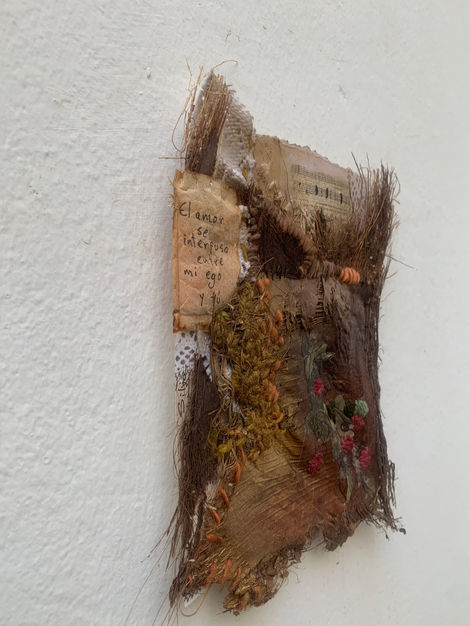 Work created with palm bark treated with tea bags, paper, sewing, embroidery, acrylic paint.