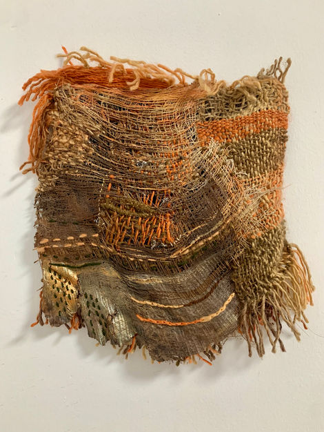 Palm tree treated with textile techniques such as loom-woven tapestry, embroidery, darning, sewing, and acrylic painting.