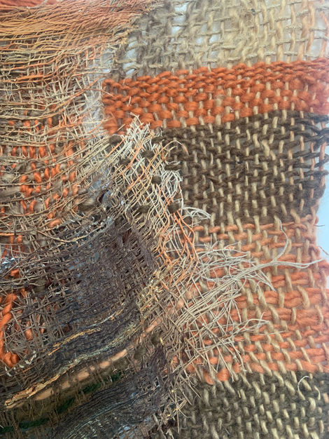 Palm tree treated with textile techniques such as loom-woven tapestry, embroidery, darning, sewing, and acrylic painting.