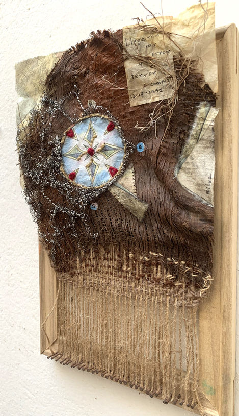 Work created on a homemade loom, palm bark treated with tea bags, paper, steel wool, sewing, embroidery, acrylic paint.