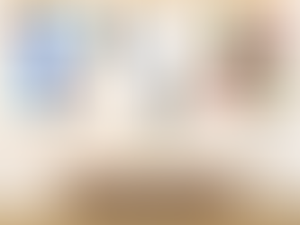 A modern interior showcases a collection of abstract art from artgaileedesign.com