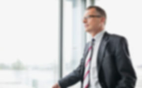 Businessman by a Window