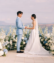 Symbolic wedding ceremony at sunset in Santorini
