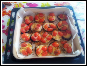 Melanzane al forno con formaggio e pomodorini