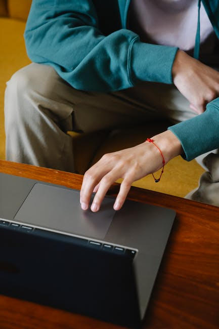 person looking at online listings