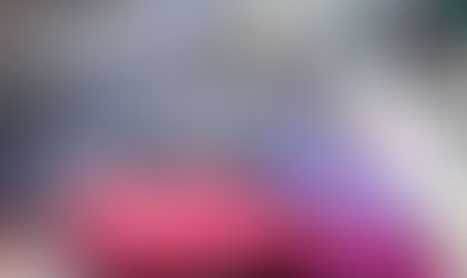 checked bags on carousel in baggage claim area