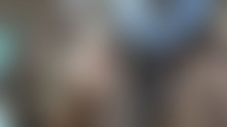 cabin crew greeting passengers as they board an aircraft