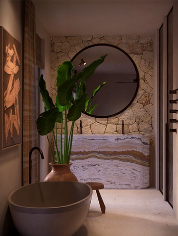 Tarida Hills Estate – bathroom with natural stone tiles, round mirror and soft warm lighting.