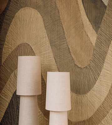Casa del Viento — natural material palette with textured stone and soft neutral tones.