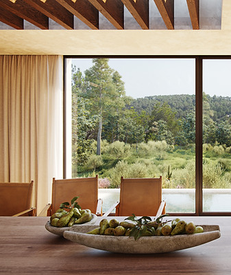 Open living space with floor-to-ceiling windows blending indoor and outdoor Mediterranean living.