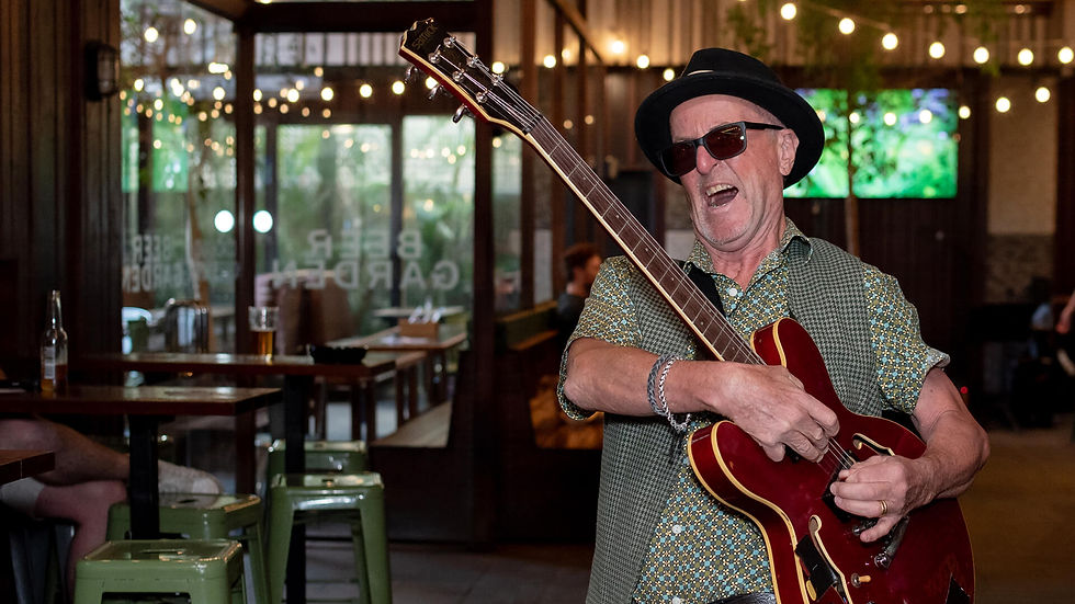 Coach & Horse Open Mic guitarist