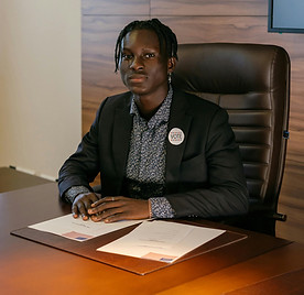 African american professional seated confidently at a desk