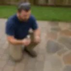 Worker comparing pressure washer nozzle tips for pavers and flagstone in Elkton