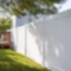 Clean white vinyl fence after mildew removal in Elkton yard