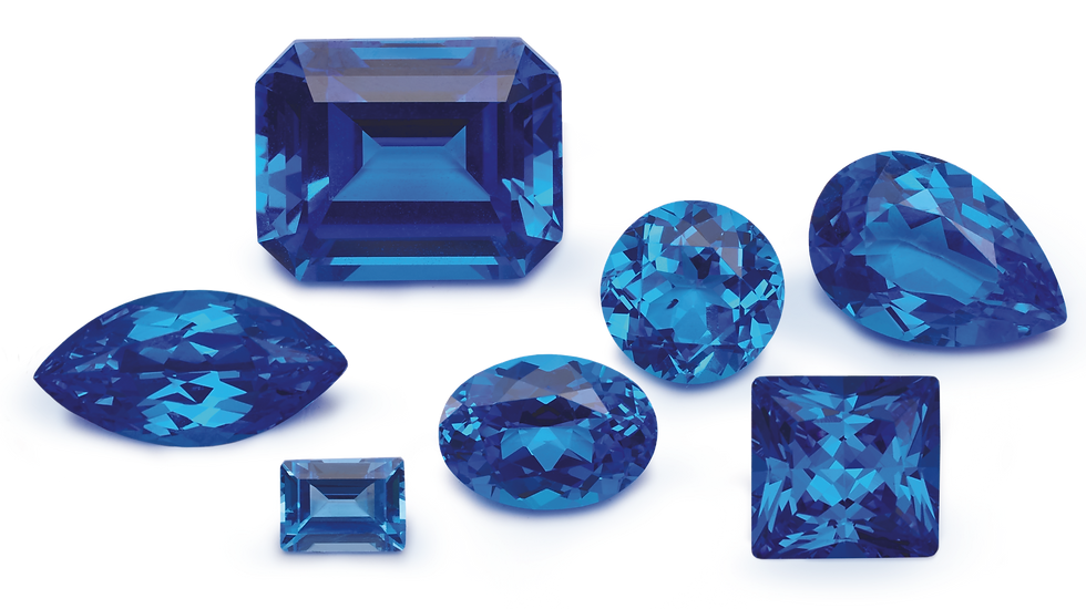 A collection of stunning blue spinel loose gemstones in various cuts, showcasing their vibrant color and clarity.