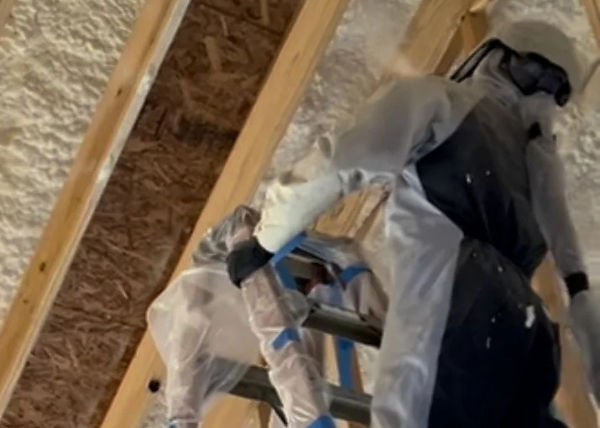 spray foam applied to exterior walls and roofline oh home stripped back to studs