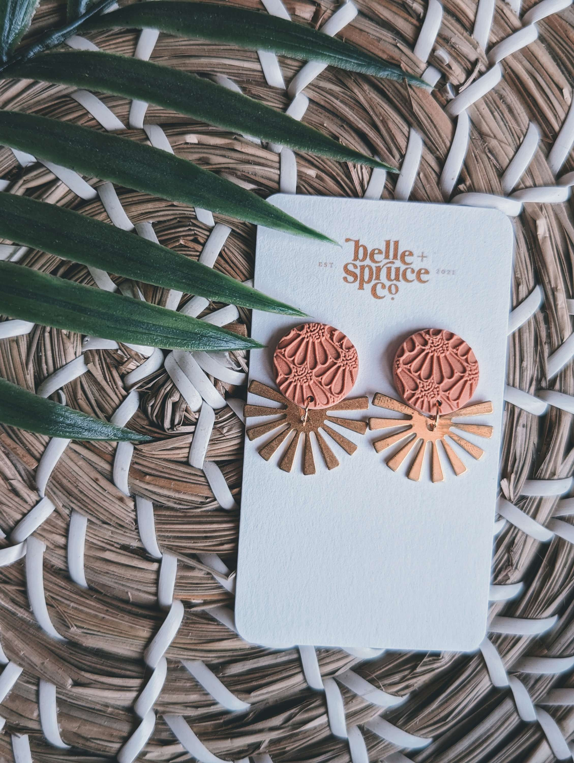 muted coral + brass dangles