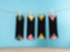 4 menstrual cloth pads hanging on a drying line.jpeg