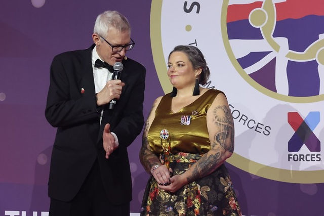 Nicky Howse being interviewed by Jeremy Vine when she won the Employee Champion Award at the 2025 Armed Forces Community Awards Soldiering On