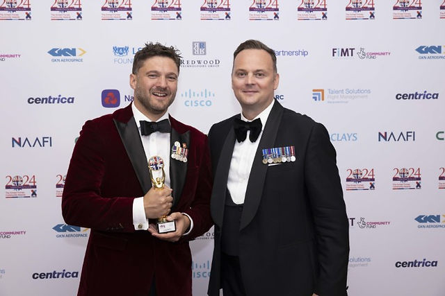Andy White, winner of the Employee Champion Award with Mark Neill, MD of Landmarc