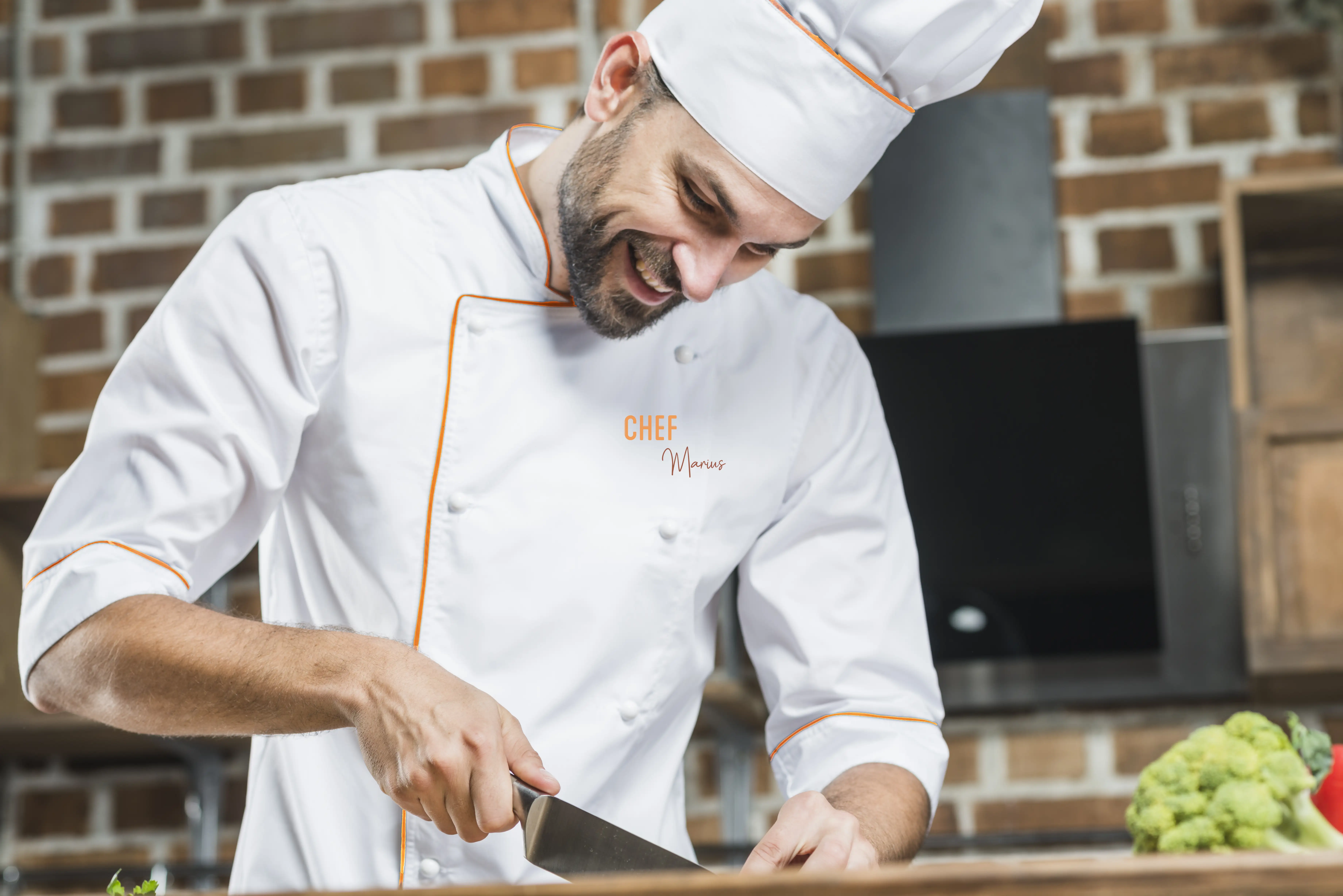 smiling-male-chef-chopping-vegetables.webp