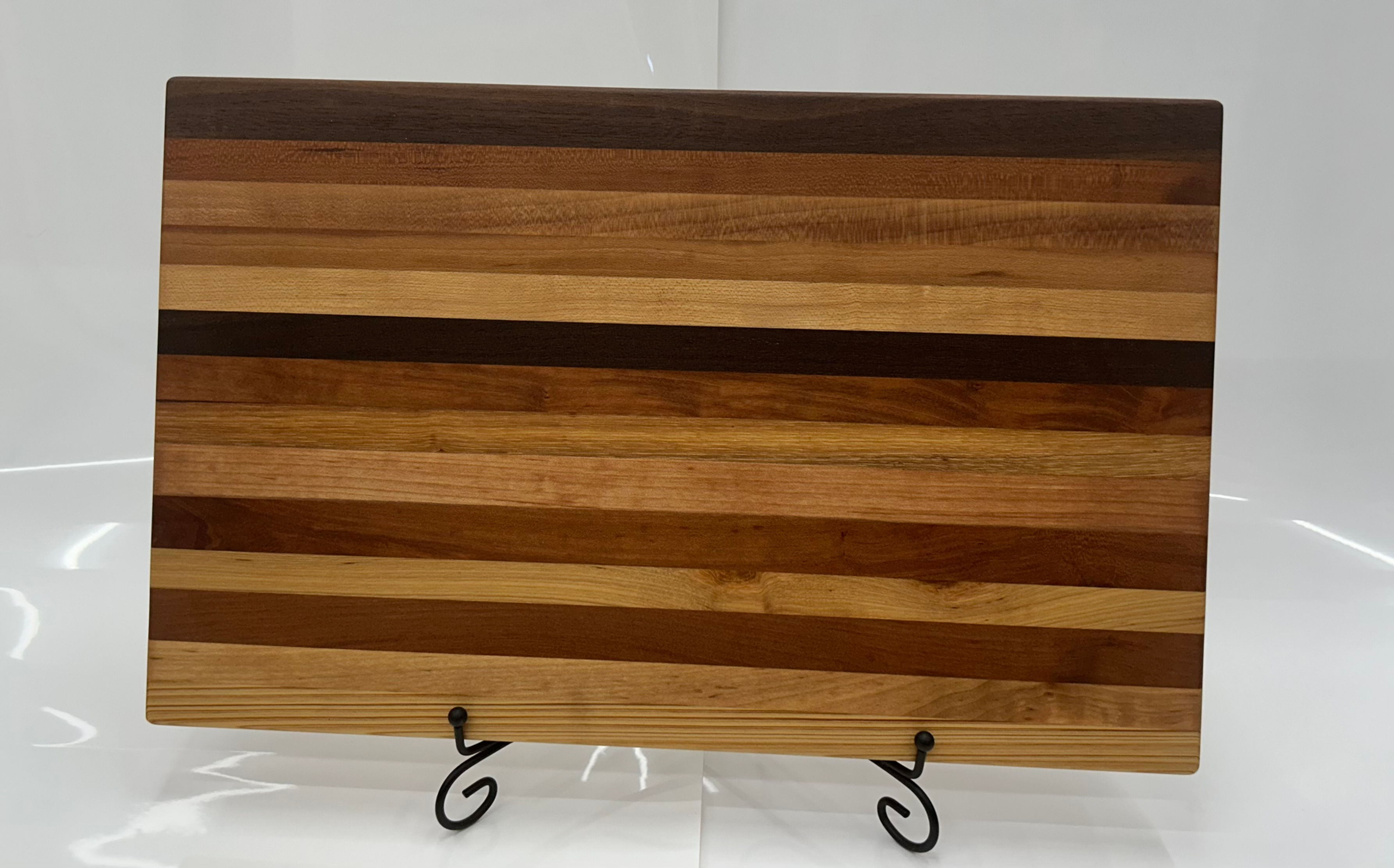 Cutting board with a variety of hard woods