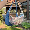 A finished handbag made from a kit.