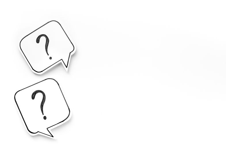 Question marks on paper speech bubbles. FAQ concept or search information concept..jpg