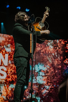 dean lewis performing on stage 