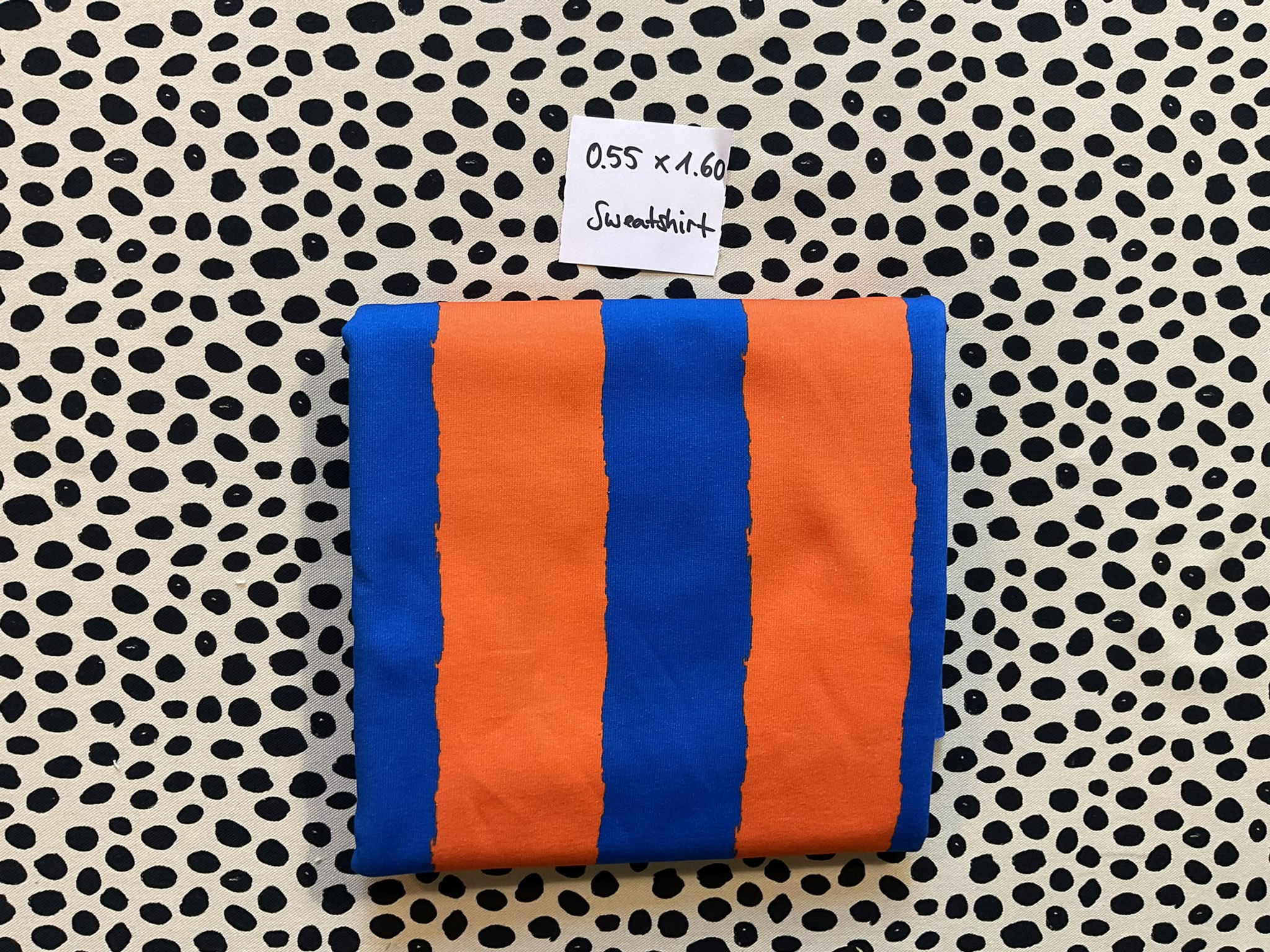 Stoffrest 0.55m x 1.60m Sweatshirt DISCO STRIPES blau orange