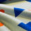 Miniaturbild: Meterware Rippjersey "LETS PARTY" graublau royalblau rot