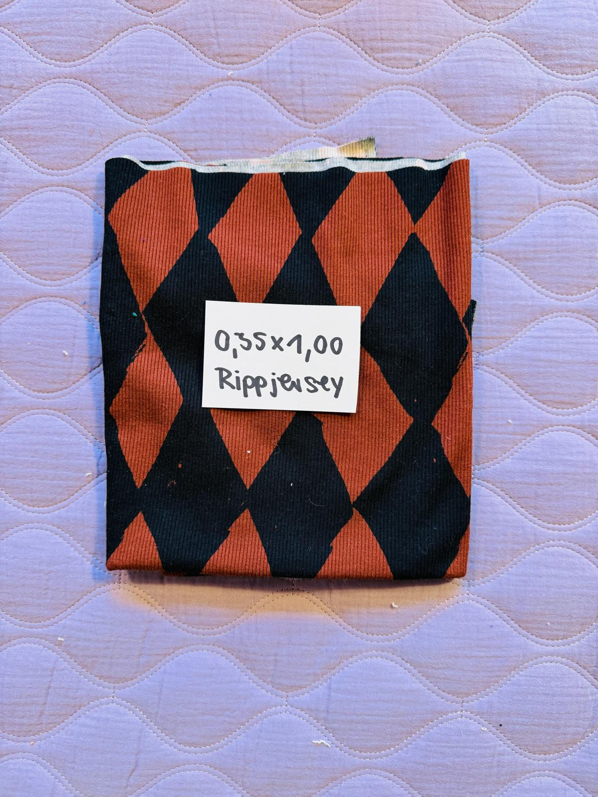 Stoffrest 0.35m x 1m Rippjersery HARLEKIN braun schwarz