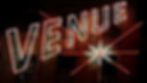 Neon sign displaying "VENUE" with white and red glowing letters against a dark background, creating a vibrant, energetic atmosphere.
