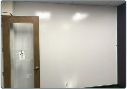 painted commercial white board wall