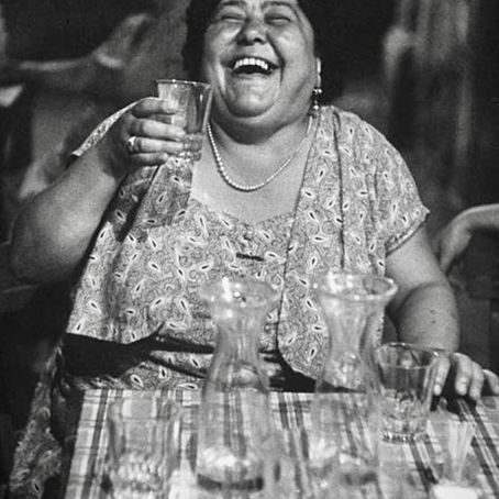 curvy woman having fun at the dining table