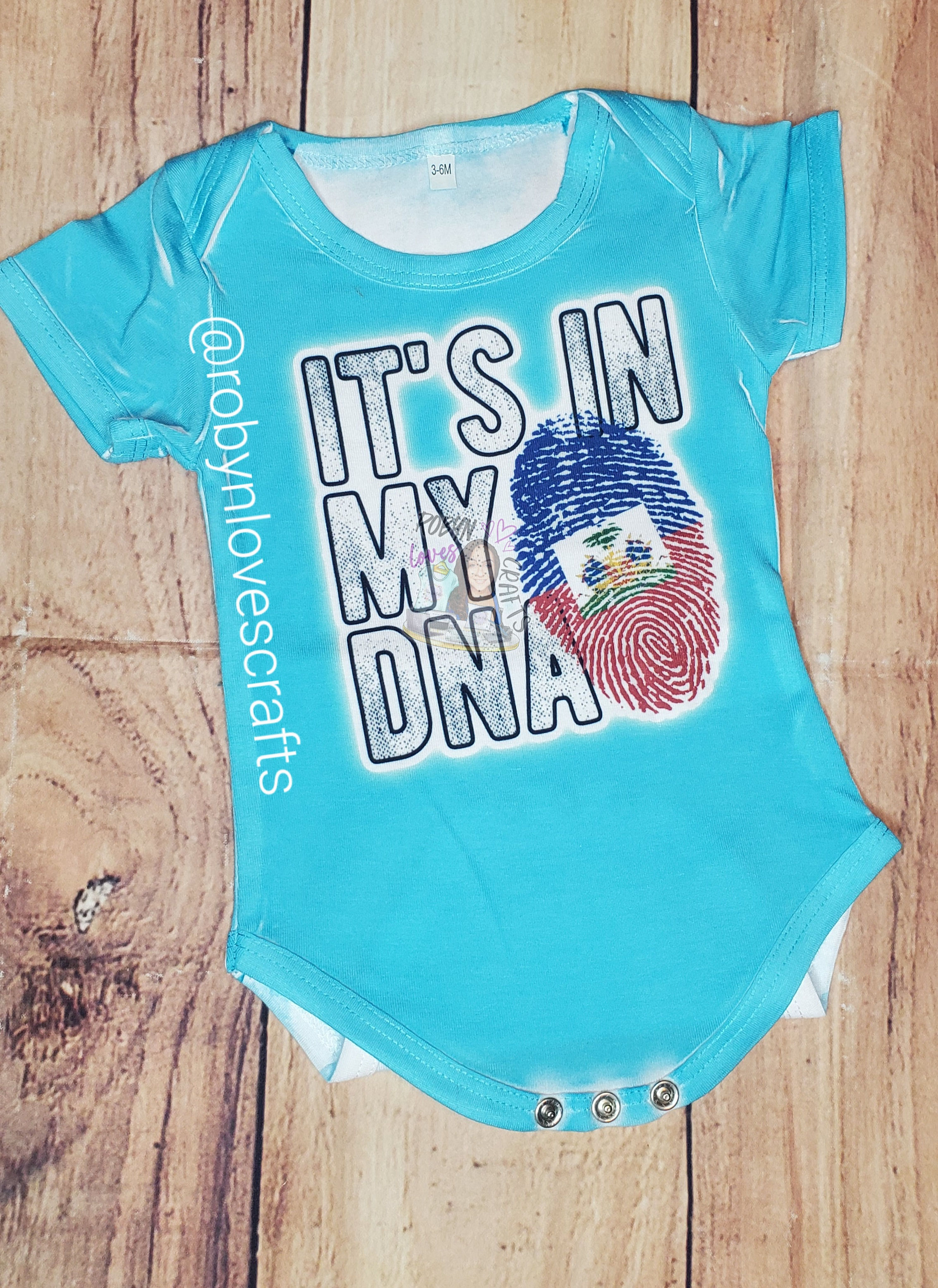 Custom All-Over Baby Bodysuit - Haiti "It's in my DNA"