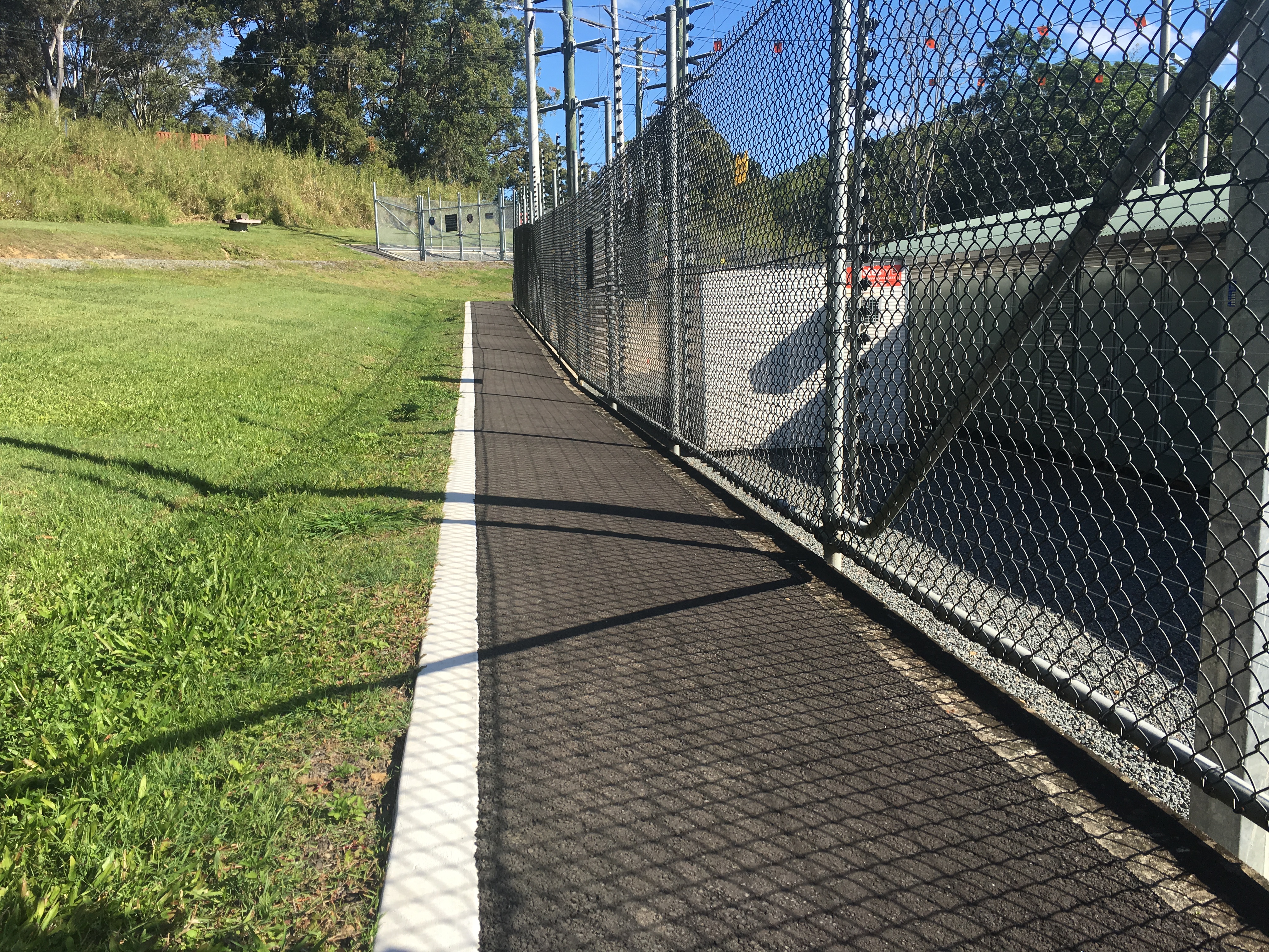Completed residential asphalt driveway — Sunshine Coast