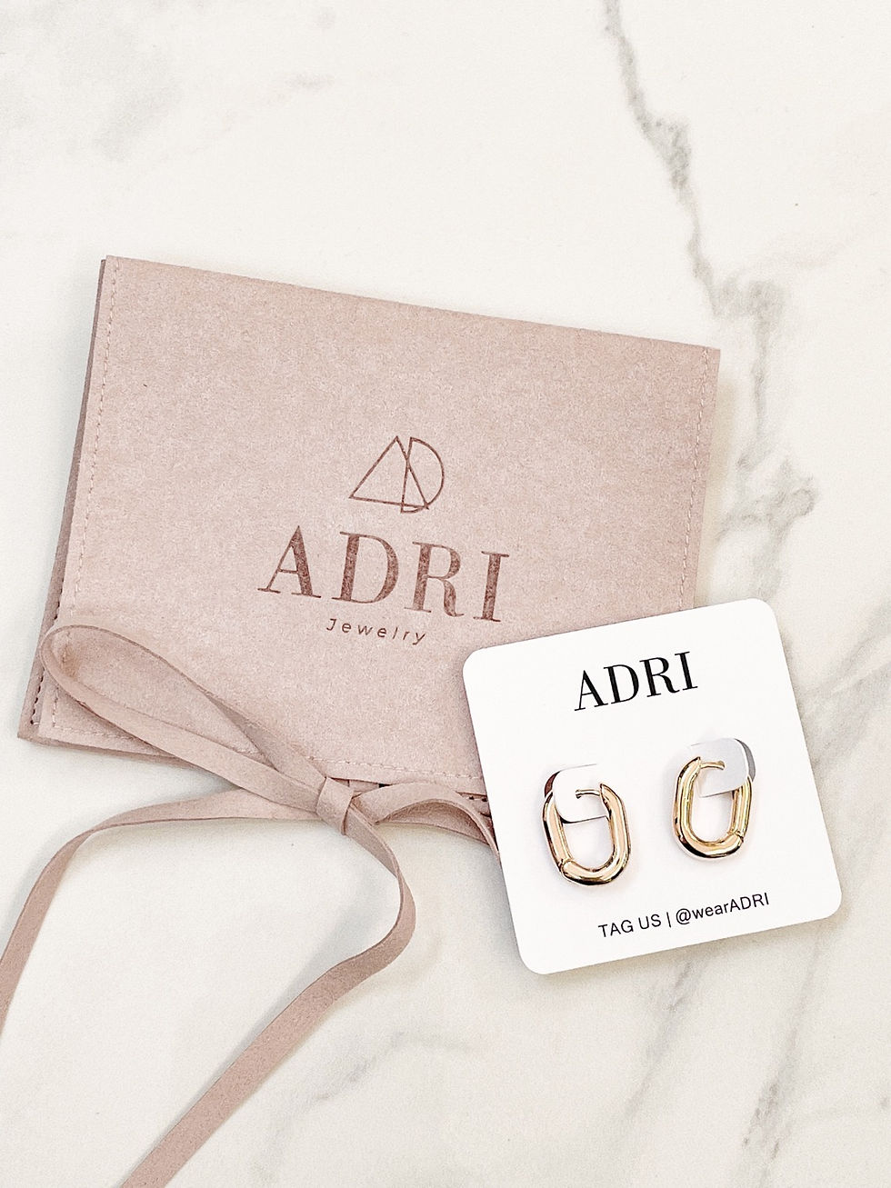 Thumbnail: Oval Tube Mini Hoop Earring - Gold