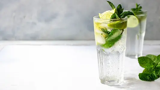 mojito-summer-refreshing-cocktail-with-ice-lime-a-2022-09-28-23-59-27-utc copy.webp
