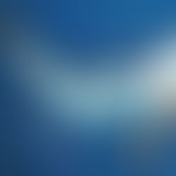 A semi-realistic depiction of old cars and planes crashing into and driving/flying over dark blue water.