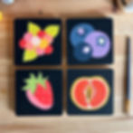 Four square-cut paintings of fruit.