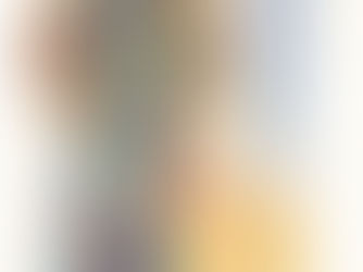 An abstract watercolor painting of a face, with a blue background.