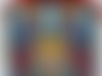 A layered quilt-style bag featuring vibrant designs including a roaring lion and two blue roosters.